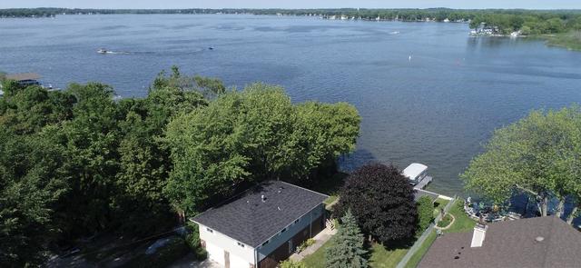 209 North Rushmore Road Fox Lake, IL 60020 - Photo 19 of 21 an aerial view of a house with a yard and lake view