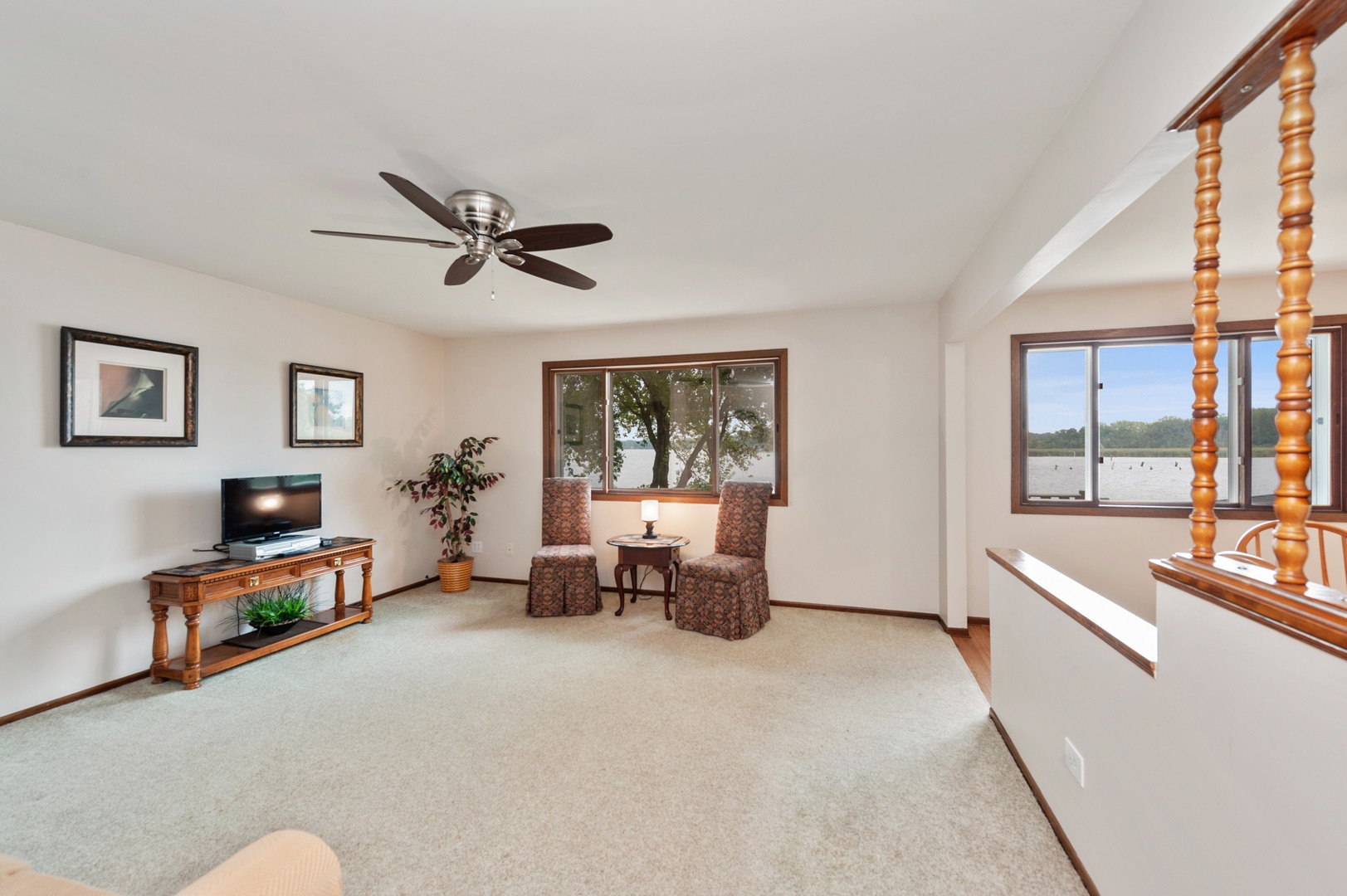 209 North Rushmore Road Fox Lake, IL 60020 - Photo 5 of 21 a living room with furniture and a flat screen tv