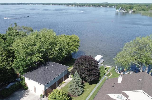 209 North Rushmore Road Fox Lake, IL 60020 - Photo 10 of 21 an aerial view of a house with a yard and lake view
