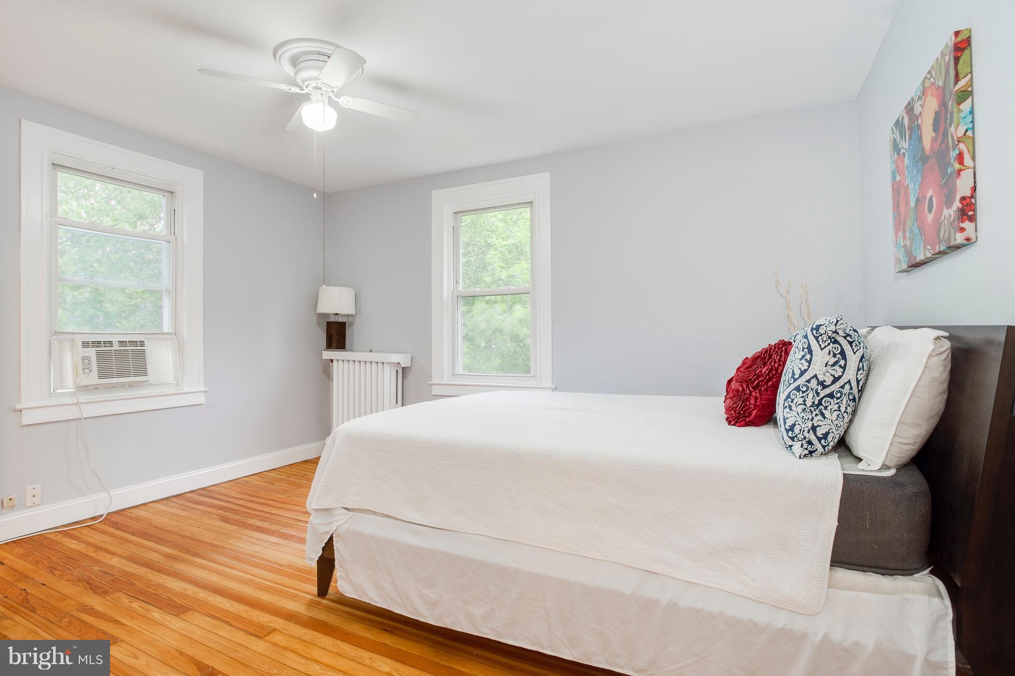 5316 Tramore Road Baltimore, MD 21214 - Photo 15 of 30 a bedroom with a bed and a window