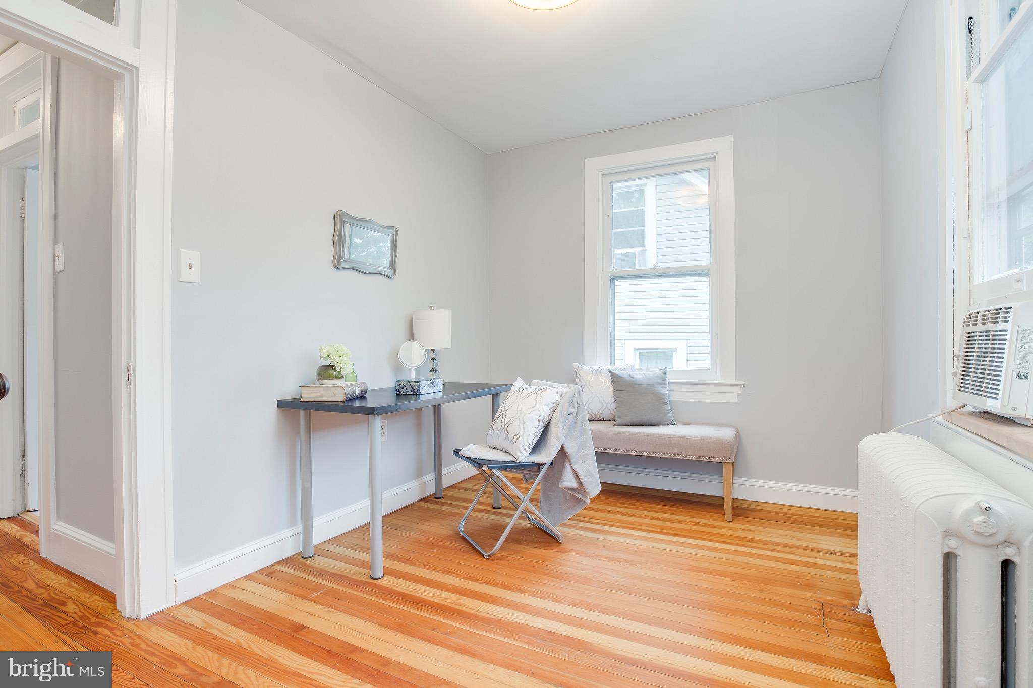 5316 Tramore Road Baltimore, MD 21214 - Photo 18 of 30 a room with furniture and windows