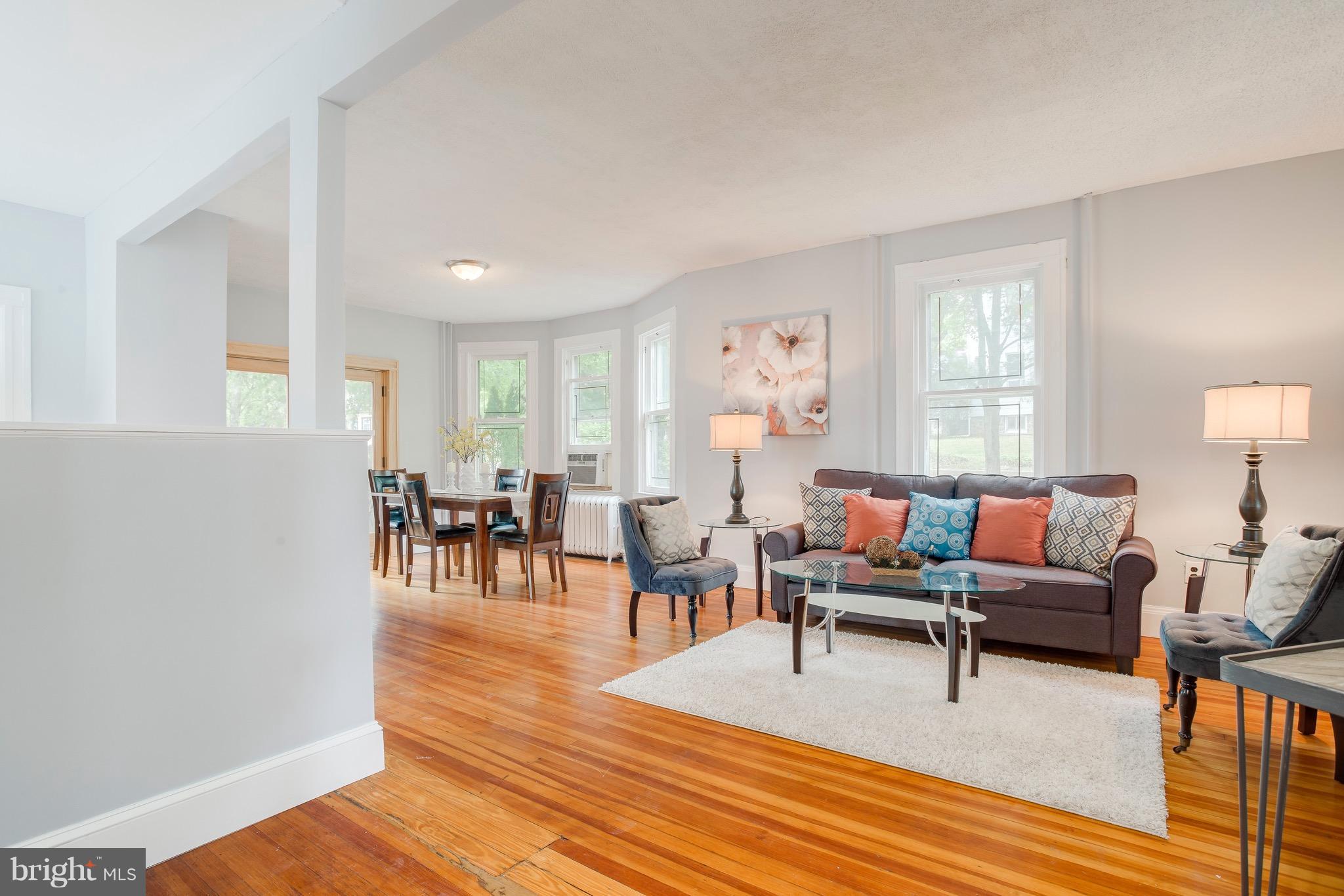 5316 Tramore Road Baltimore, MD 21214 - Photo 5 of 30 a living room with furniture and wooden floor