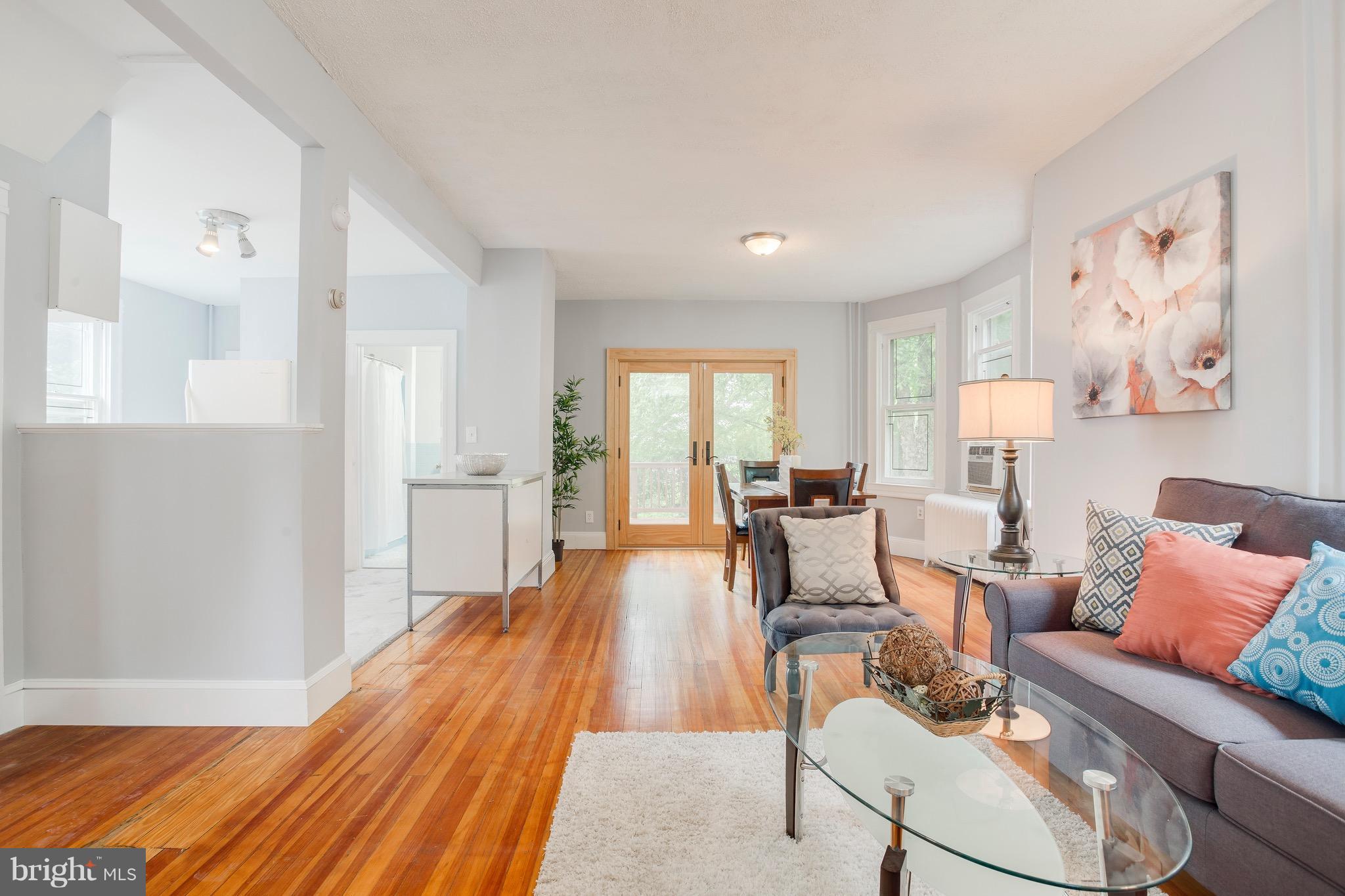 5316 Tramore Road Baltimore, MD 21214 - Photo 30 of 30 a living room with furniture and a wooden floor