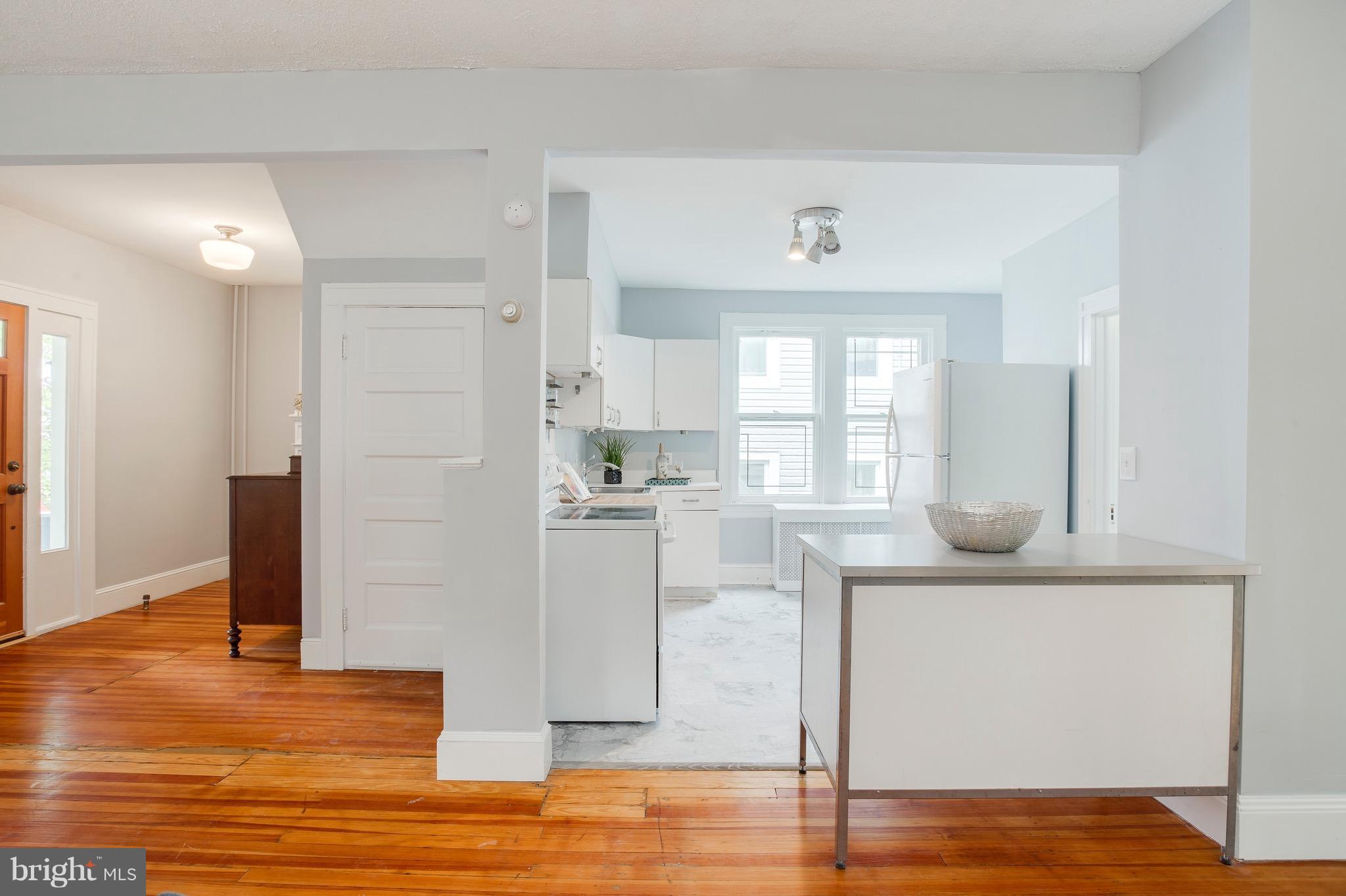 5316 Tramore Road Baltimore, MD 21214 - Photo 8 of 30 a view of a kitchen with wooden floor