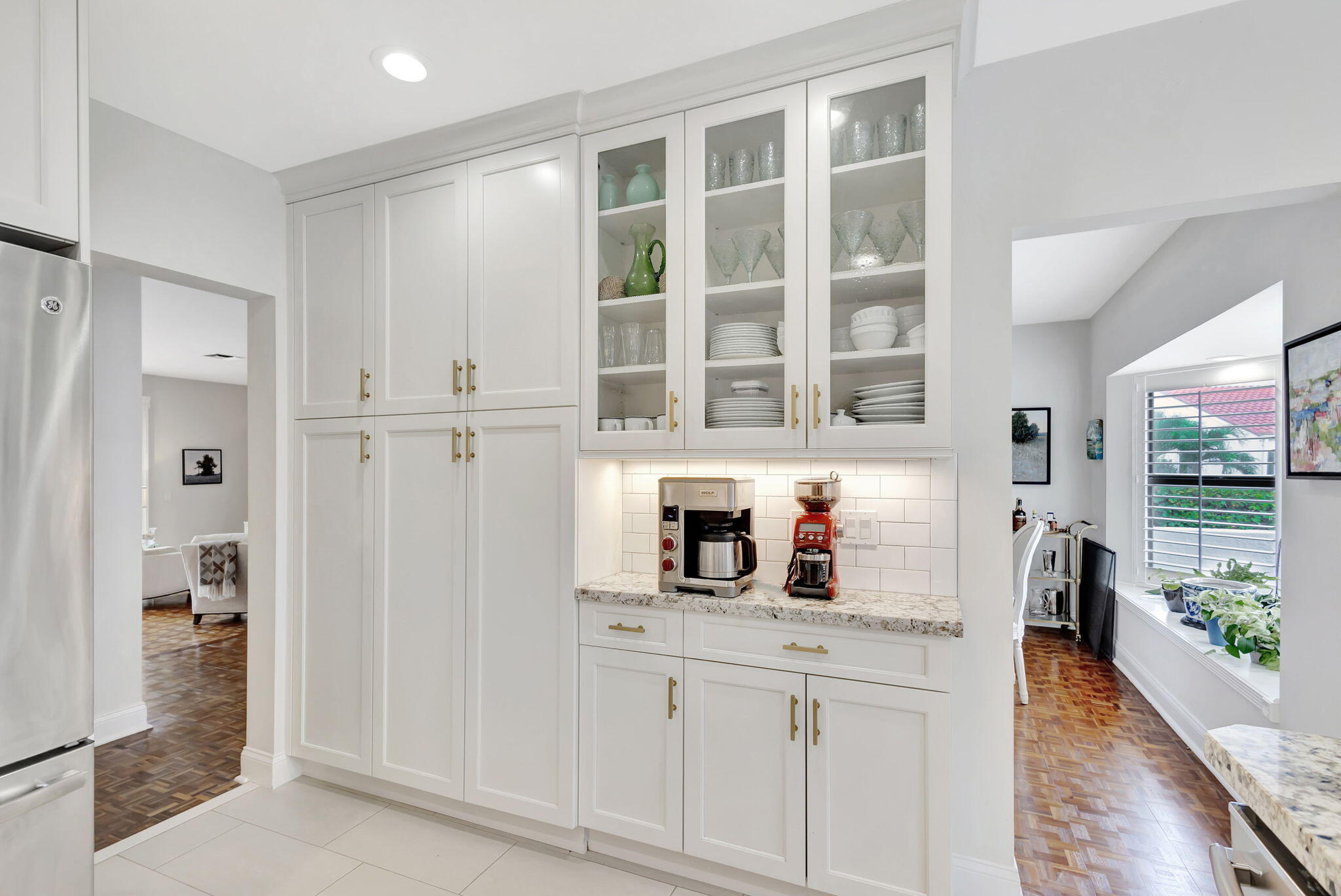170 Celestial Way, Unit 83 Juno Beach, FL 33408 - Photo 21 of 70 a kitchen with stainless steel appliances granite countertop a refrigerator and a sink