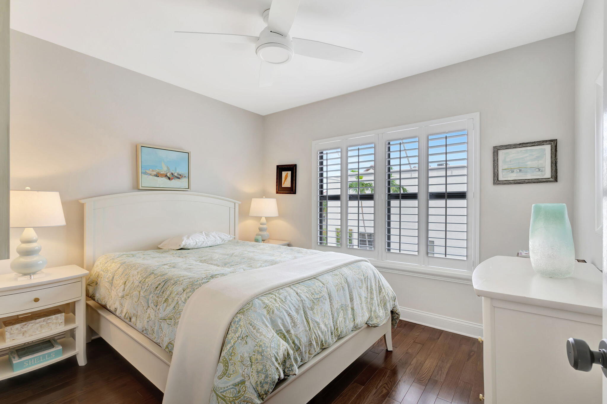 170 Celestial Way, Unit 83 Juno Beach, FL 33408 - Photo 40 of 70 a bedroom with a large bed and a window