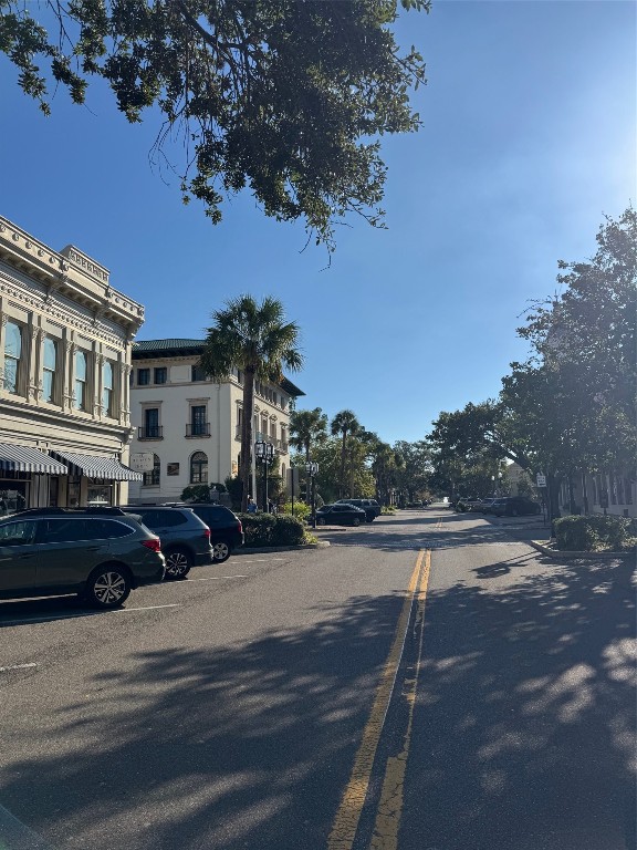 323 Division Street Fernandina Beach, FL 32034 - Photo 4 of 4 a city street lined with buildings and trees