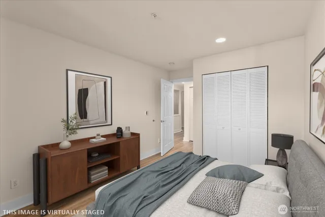 a bedroom with a bed and furniture