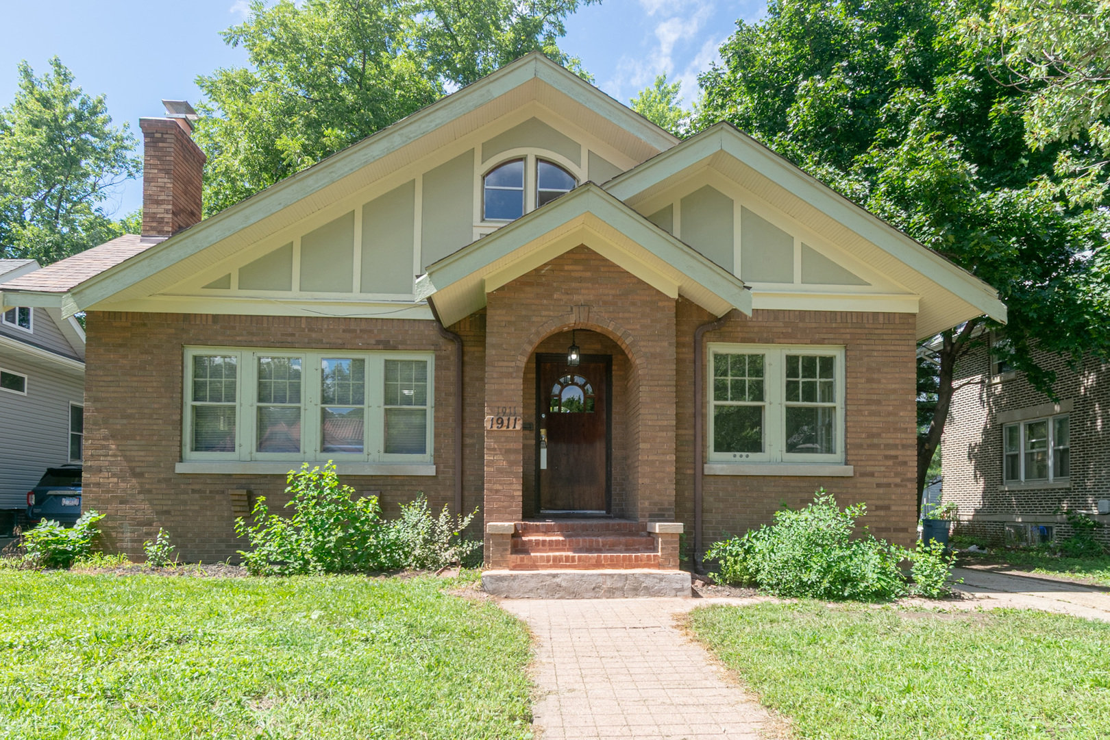 1911 South 4th Street Rockford, IL 61104 - Photo 1 of 1 a front view of a house with a yard