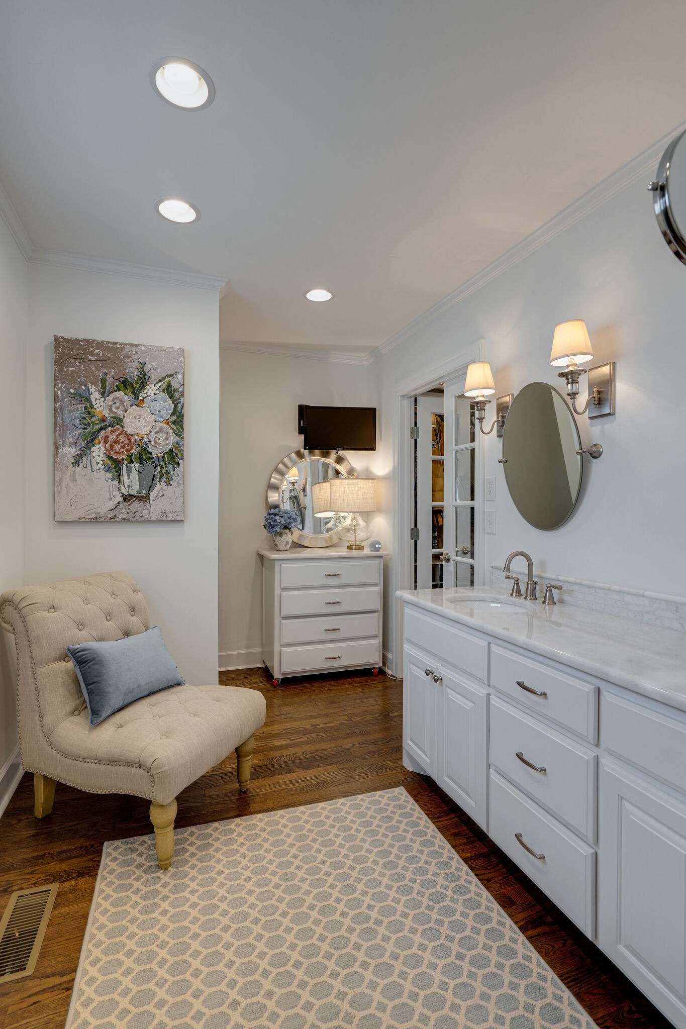 Undisclosed Address Nashville, TN 37204 - Photo 19 of 24 a spacious bathroom with a double vanity sink and a mirror
