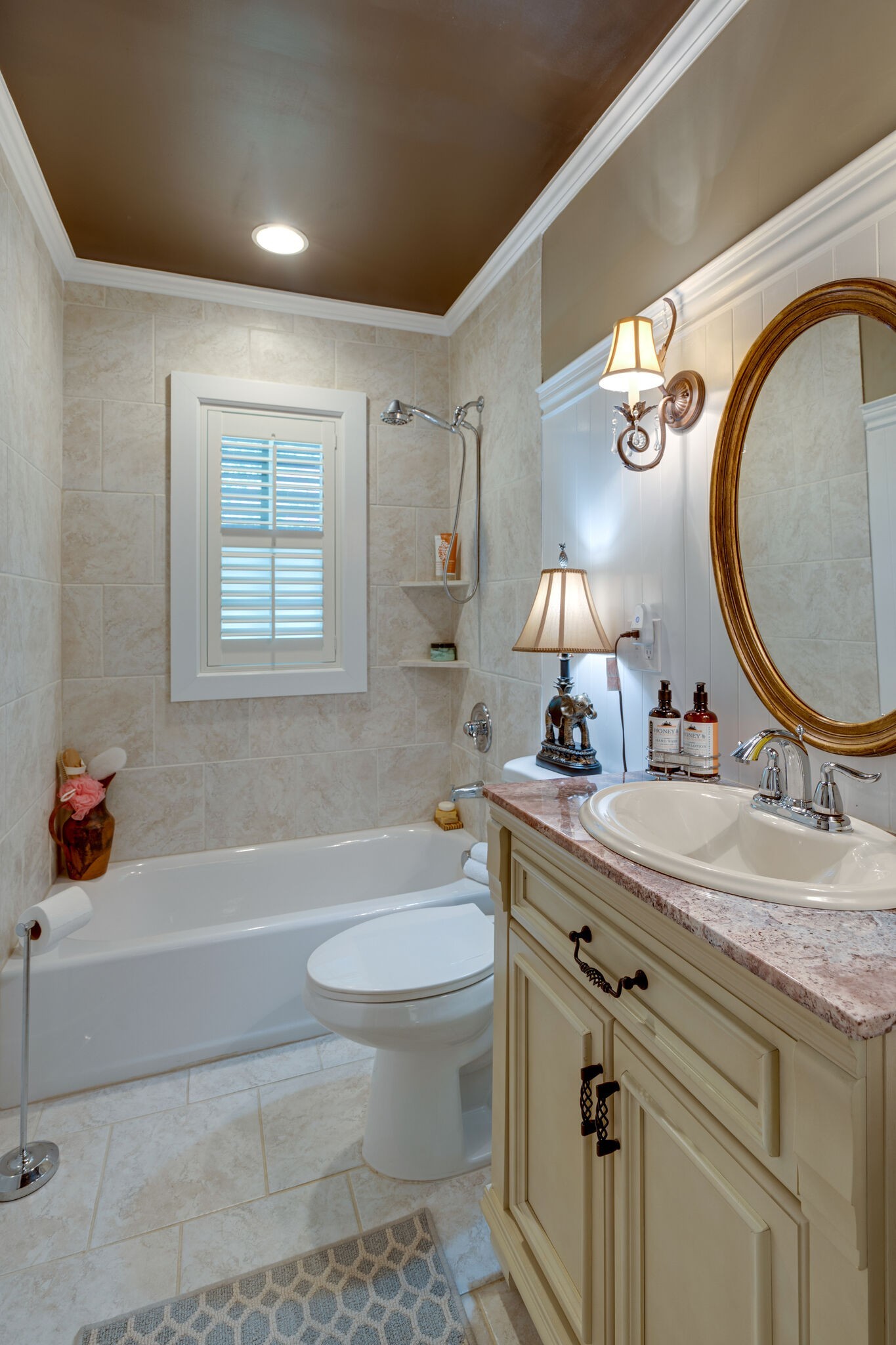Undisclosed Address Nashville, TN 37204 - Photo 21 of 24 a bathroom with a sink a toilet and a mirror