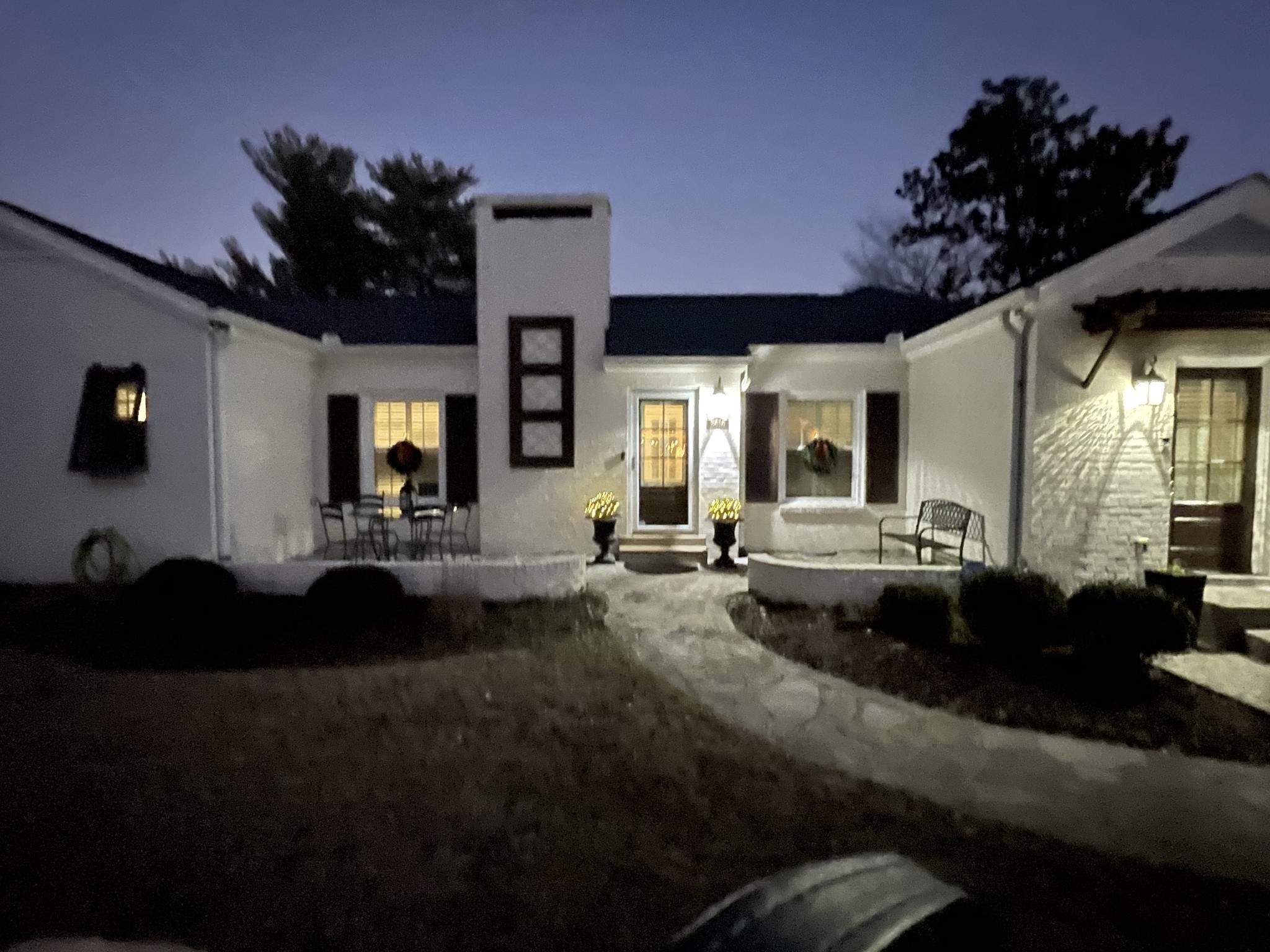 Undisclosed Address Nashville, TN 37204 - Photo 3 of 24 a living room with furniture and a flat screen tv