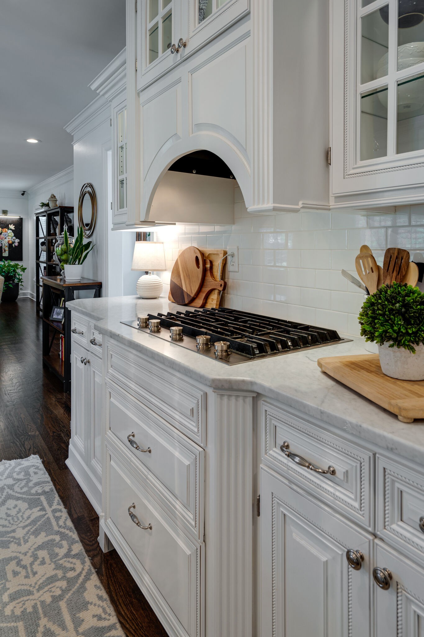 Undisclosed Address Nashville, TN 37204 - Photo 9 of 24 a kitchen with granite countertop white cabinets and appliances