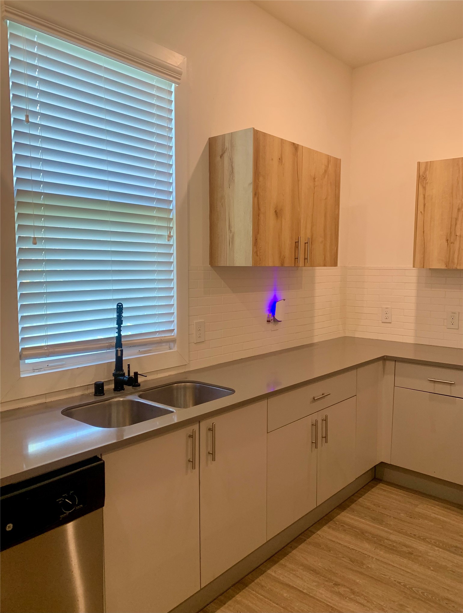10209 Las Nubes Avenue Houston, TX 77075 - Photo 5 of 29 a kitchen with a sink and cabinets