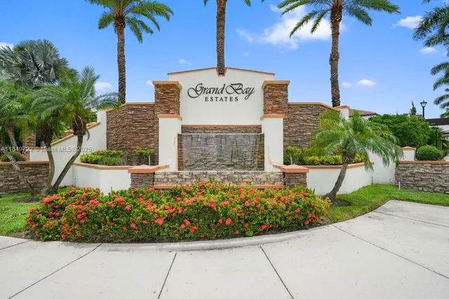 a view of a park with large trees