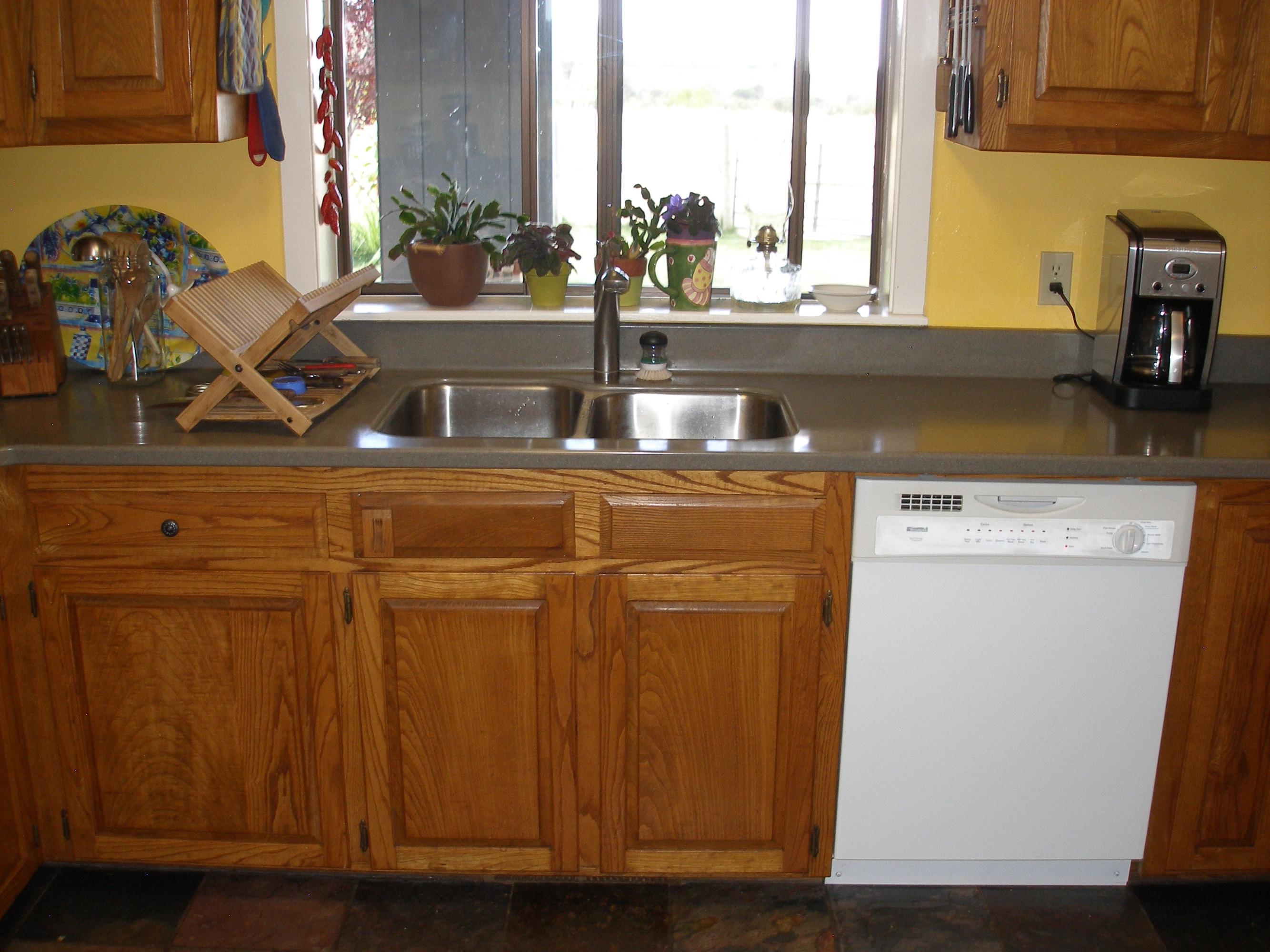 32135 Rock Creek Road Manton, CA 96059 - Photo 19 of 65 a view of a sink with wooden cabinets