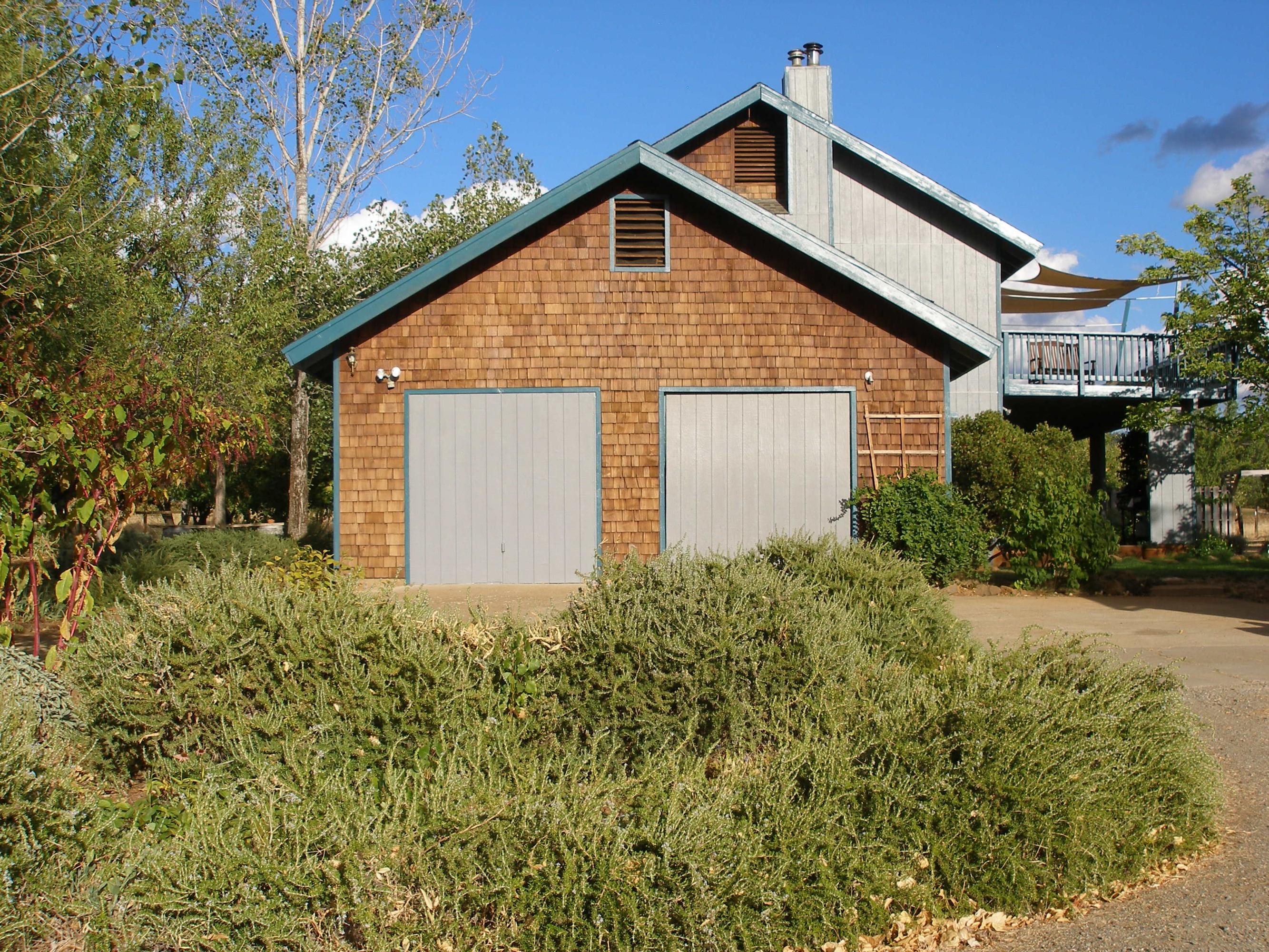 32135 Rock Creek Road Manton, CA 96059 - Photo 2 of 65 a front view of a house with garden