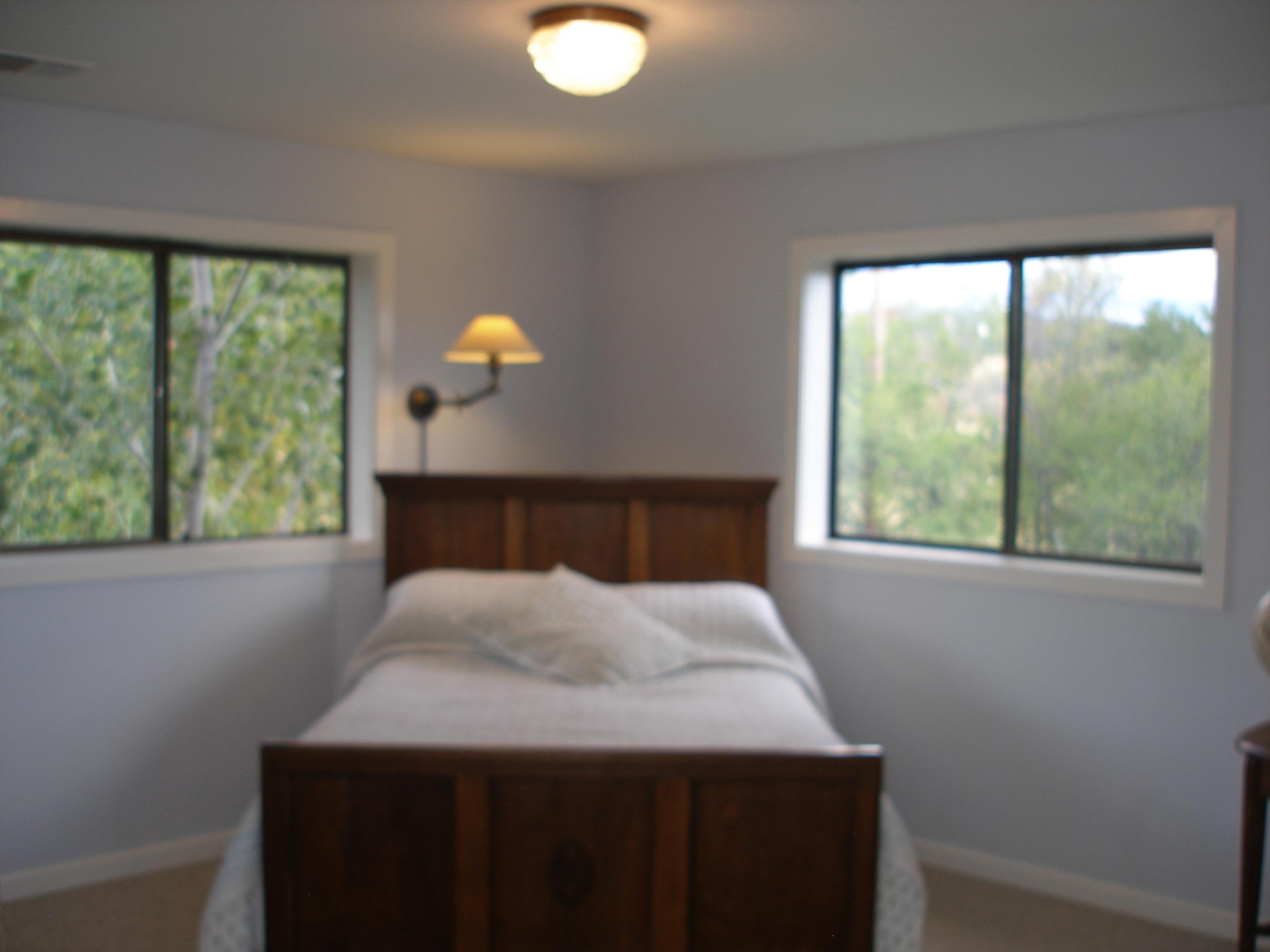 32135 Rock Creek Road Manton, CA 96059 - Photo 31 of 65 a bedroom with a bed and a window