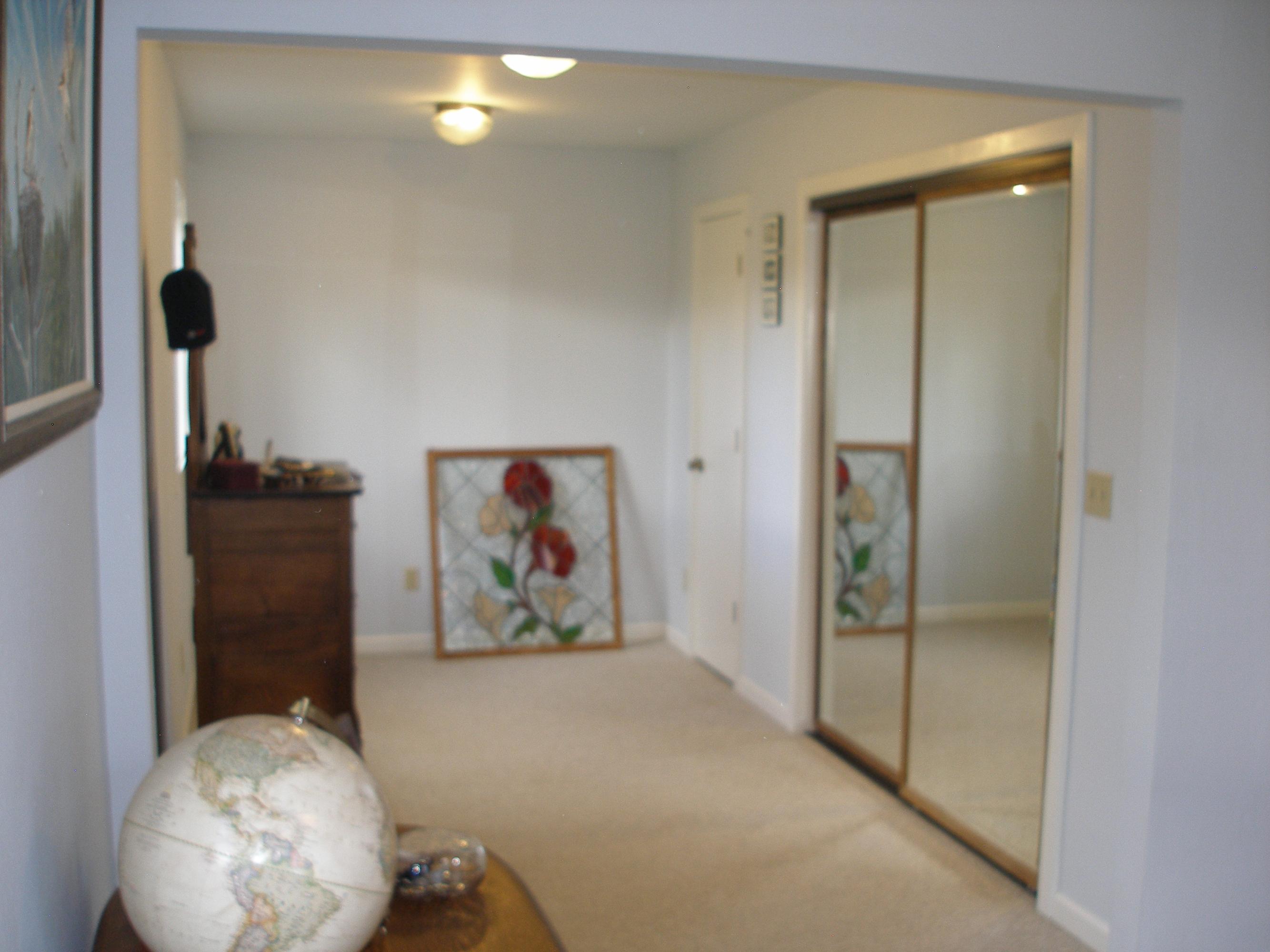 32135 Rock Creek Road Manton, CA 96059 - Photo 34 of 65 a view of a hallway with paintings on the wall