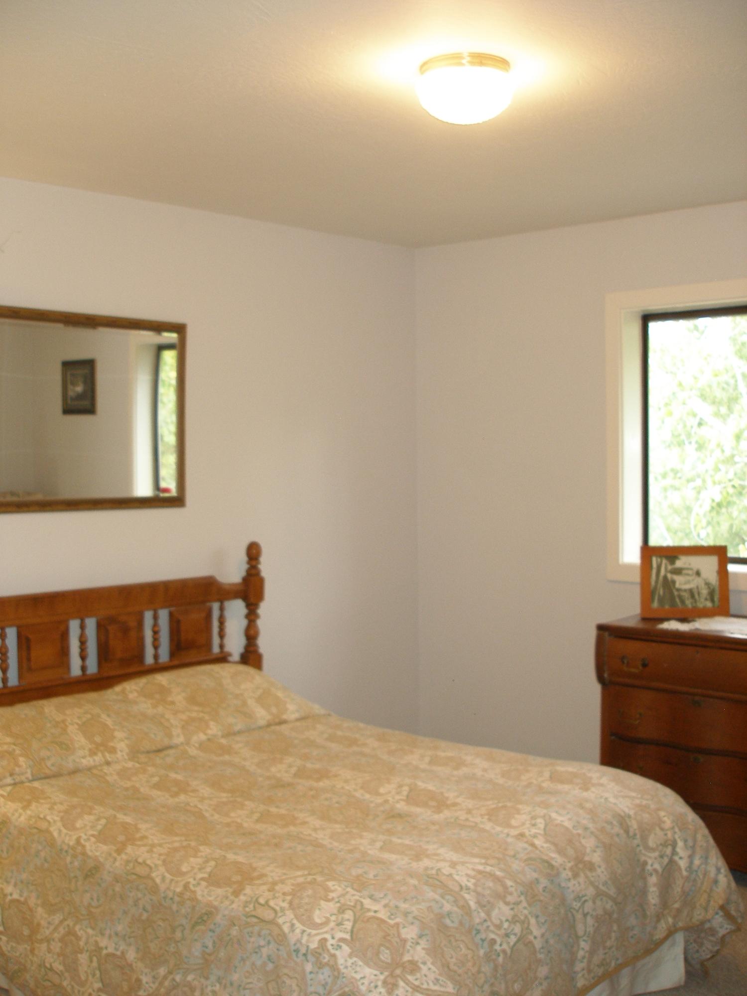 32135 Rock Creek Road Manton, CA 96059 - Photo 37 of 65 a bedroom with a bed and a window