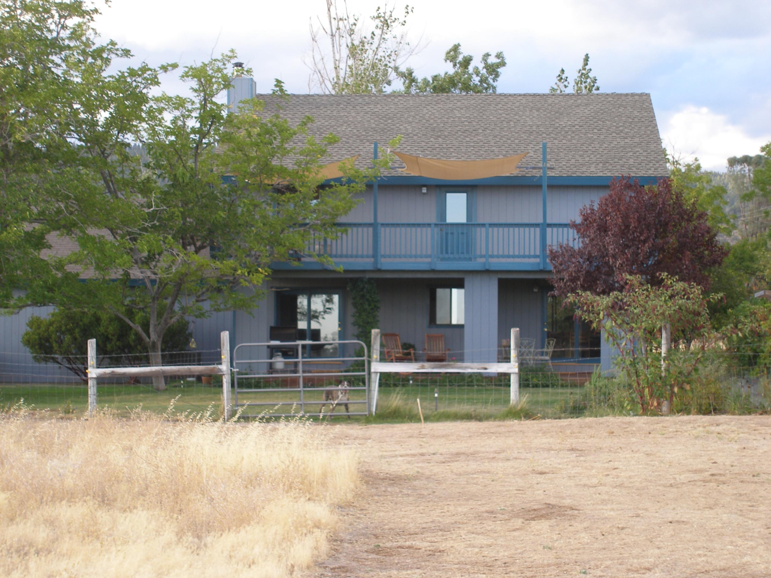 32135 Rock Creek Road Manton, CA 96059 - Photo 9 of 65 a front view of a house with a small yard