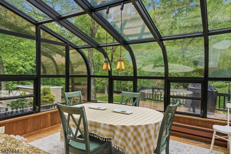 156 Kingsland Road Boonton, NJ 07005 - Photo 14 of 38 a view of a city from a dining room with large windows