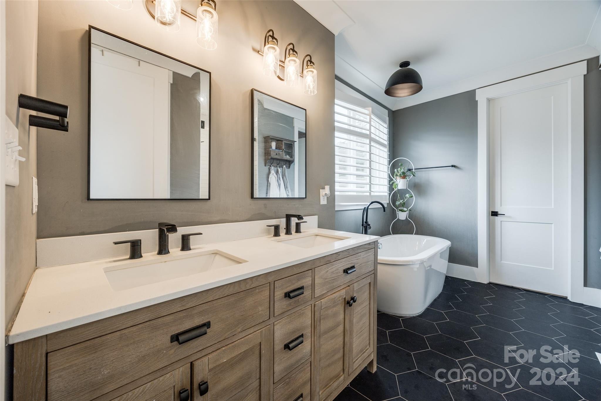 785 Ormand Road York, SC 29745 - Photo 19 of 46 a bathroom with a double vanity sink mirror and toilet