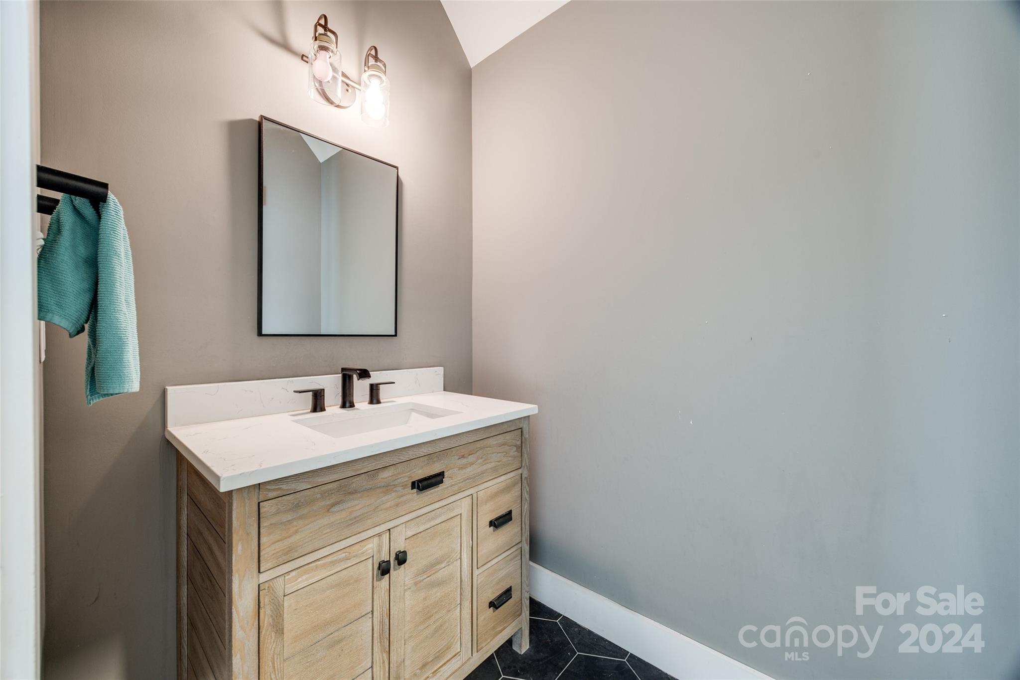 785 Ormand Road York, SC 29745 - Photo 27 of 46 a bathroom with a sink and a mirror