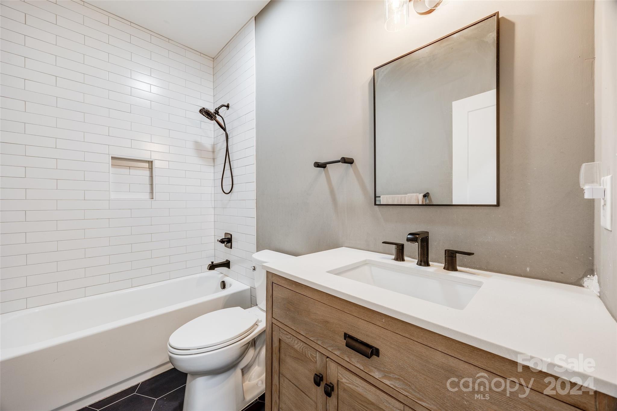 785 Ormand Road York, SC 29745 - Photo 32 of 46 a bathroom with a sink a toilet and a mirror