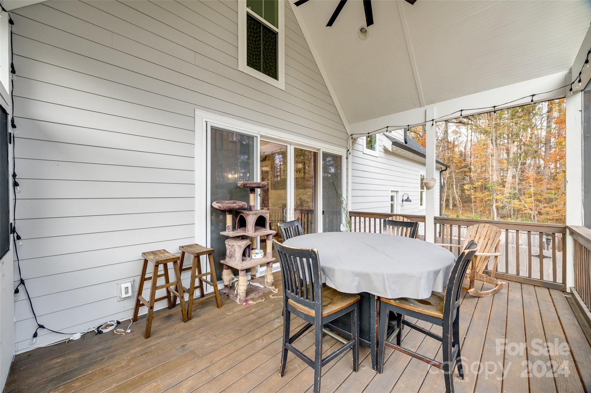 785 Ormand Road York, SC 29745 - Photo 35 of 46 a view of a patio with table and chairs with wooden floor and fence