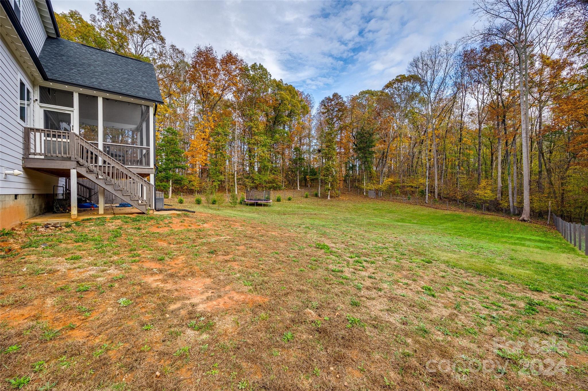 785 Ormand Road York, SC 29745 - Photo 36 of 46 a backyard of a house with lots of green space