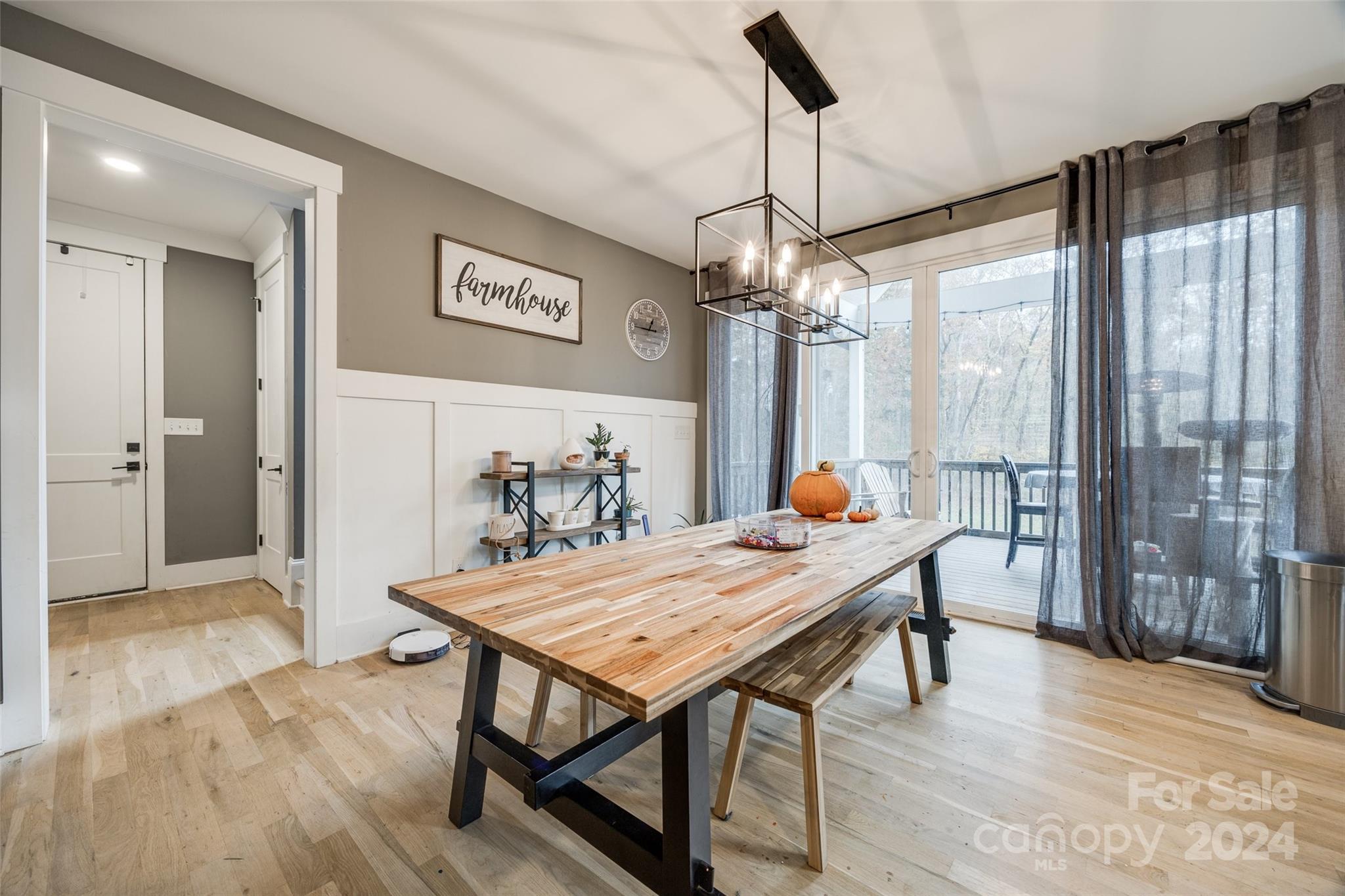 785 Ormand Road York, SC 29745 - Photo 9 of 46 a view of a dining room and livingroom with furniture wooden floor a chandelier