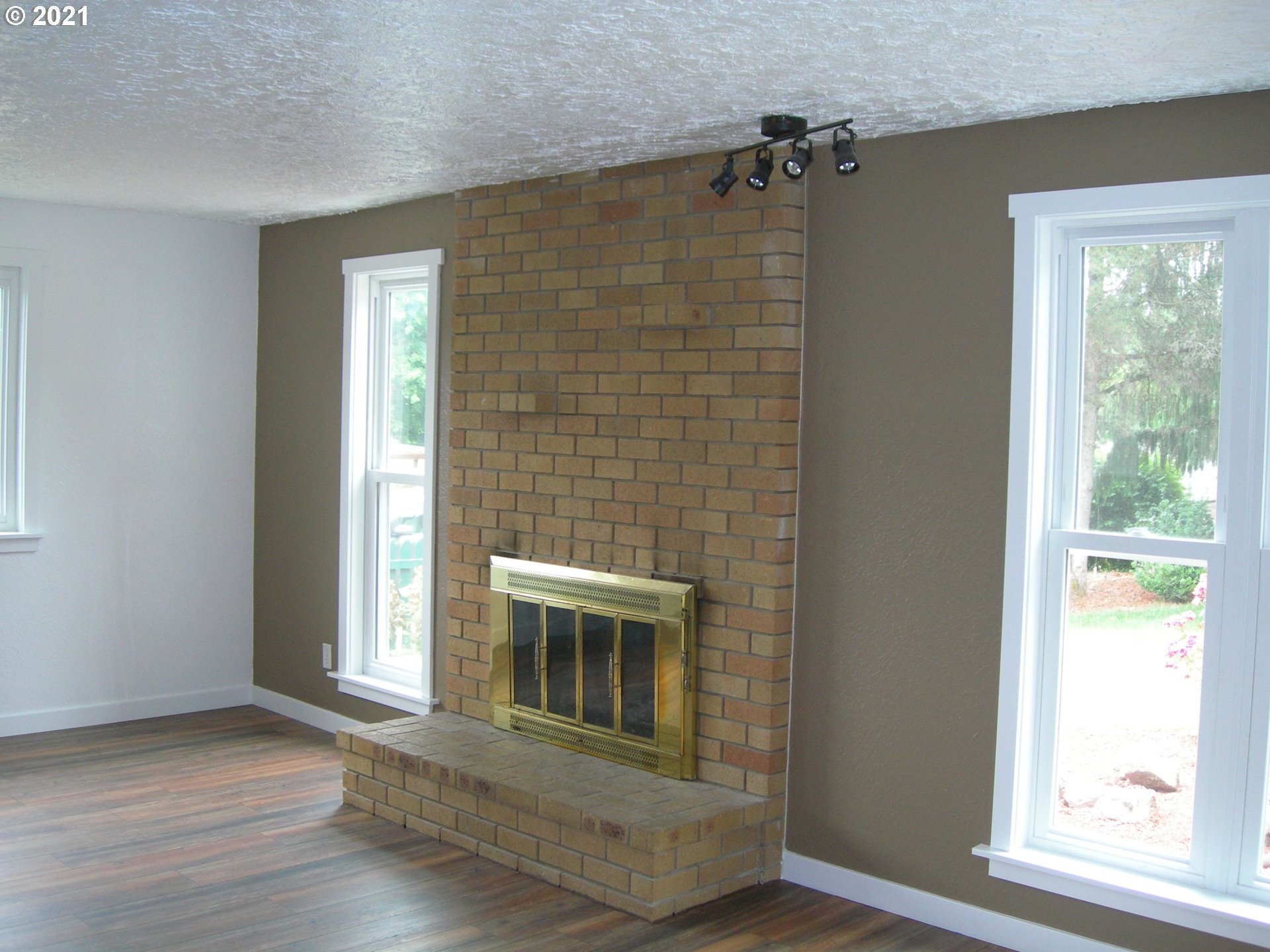 3310 Northeast 162nd Street Ridgefield, WA 98642 - Photo 9 of 13 a view of a livingroom with a fireplace