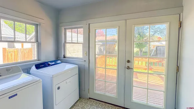 a utility room with dryer and washer
