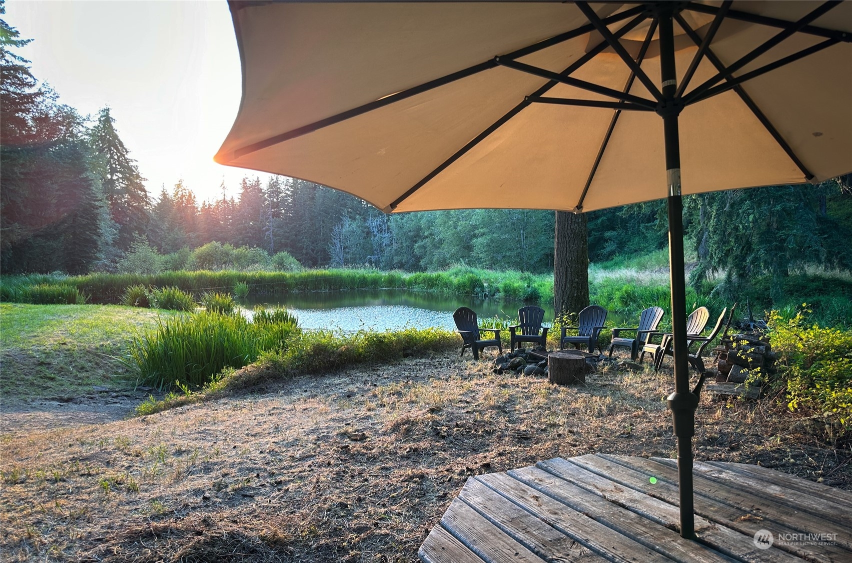 3018 King Road Chehalis, WA 98532 - Photo 8 of 40 a view of a table and chairs under an umbrella