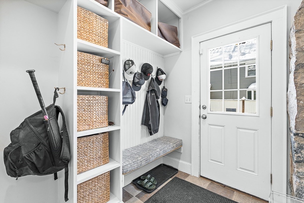 23 Jefferson Road Winchester, MA 01890 - Photo 14 of 41 a view of walk in closet with clothes and shoes