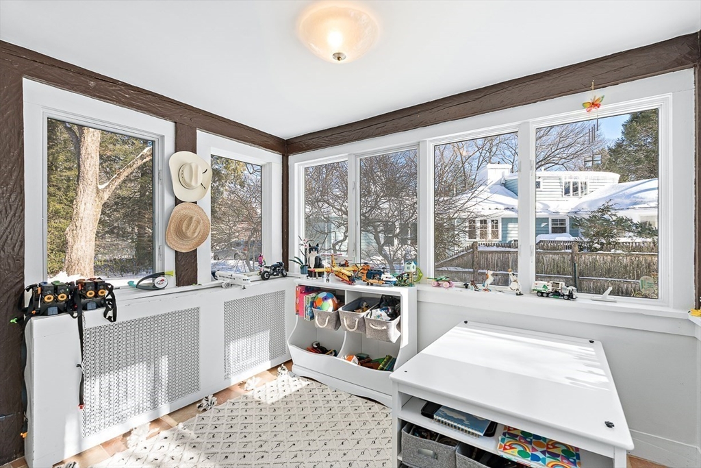 23 Jefferson Road Winchester, MA 01890 - Photo 16 of 41 a very nice looking living room with a large window and dining table