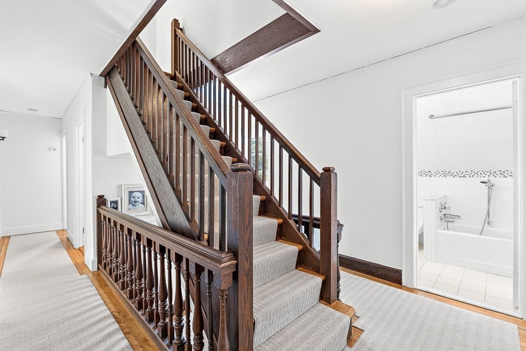 23 Jefferson Road Winchester, MA 01890 - Photo 18 of 41 a view of staircase with wooden floor and stairs
