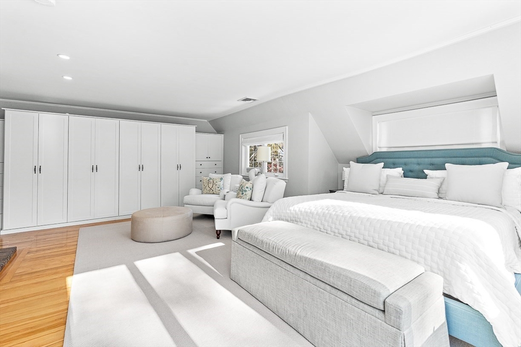 23 Jefferson Road Winchester, MA 01890 - Photo 22 of 41 a large white bed in a white room