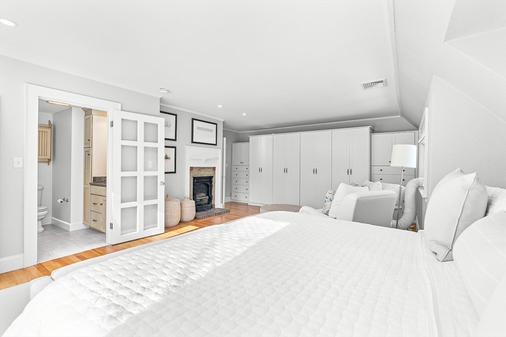 23 Jefferson Road Winchester, MA 01890 - Photo 23 of 41 a spacious bedroom with a bed and a cabinets