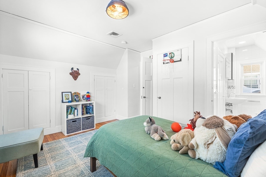 23 Jefferson Road Winchester, MA 01890 - Photo 25 of 41 a bedroom with a bed and a window