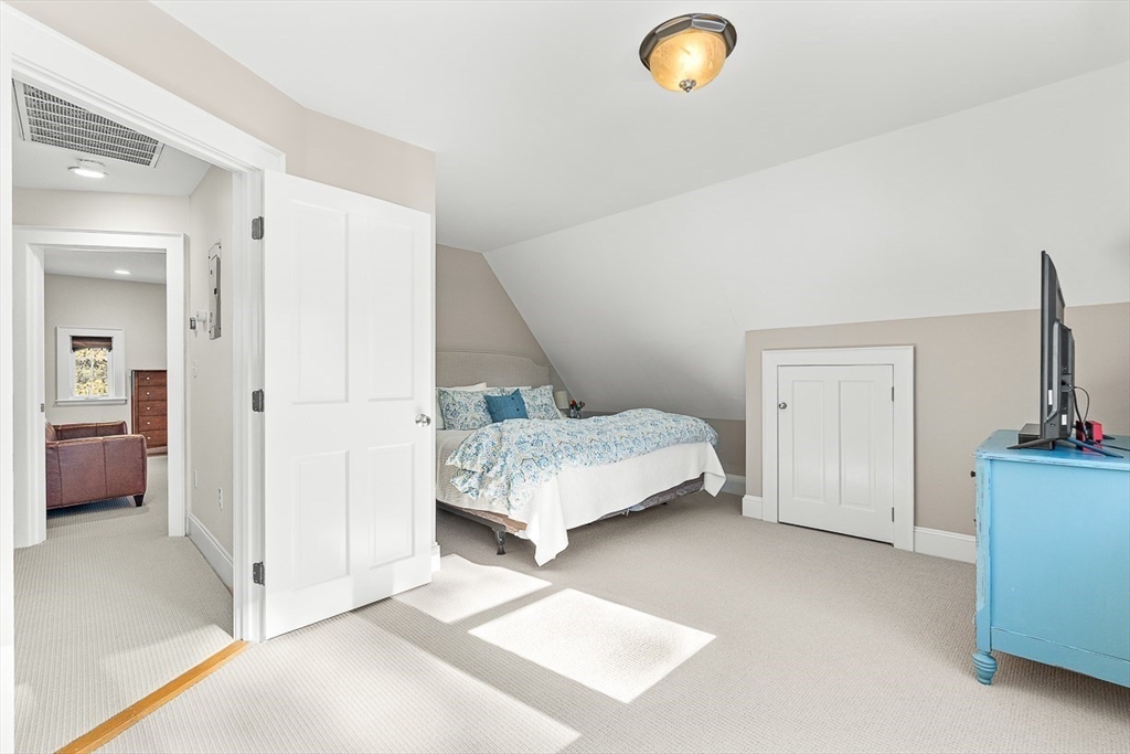 23 Jefferson Road Winchester, MA 01890 - Photo 35 of 41 a bedroom with a bed and a view of bathroom