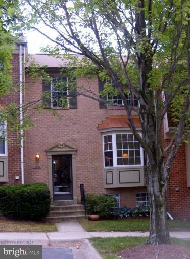 1960 Flowering Tree Terrace Silver Spring, MD 20902 - Photo 1 of 24 Stately Brick Front Exterior
