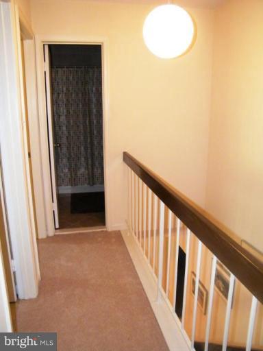 1960 Flowering Tree Terrace Silver Spring, MD 20902 - Photo 13 of 24 Upper Level Hallway