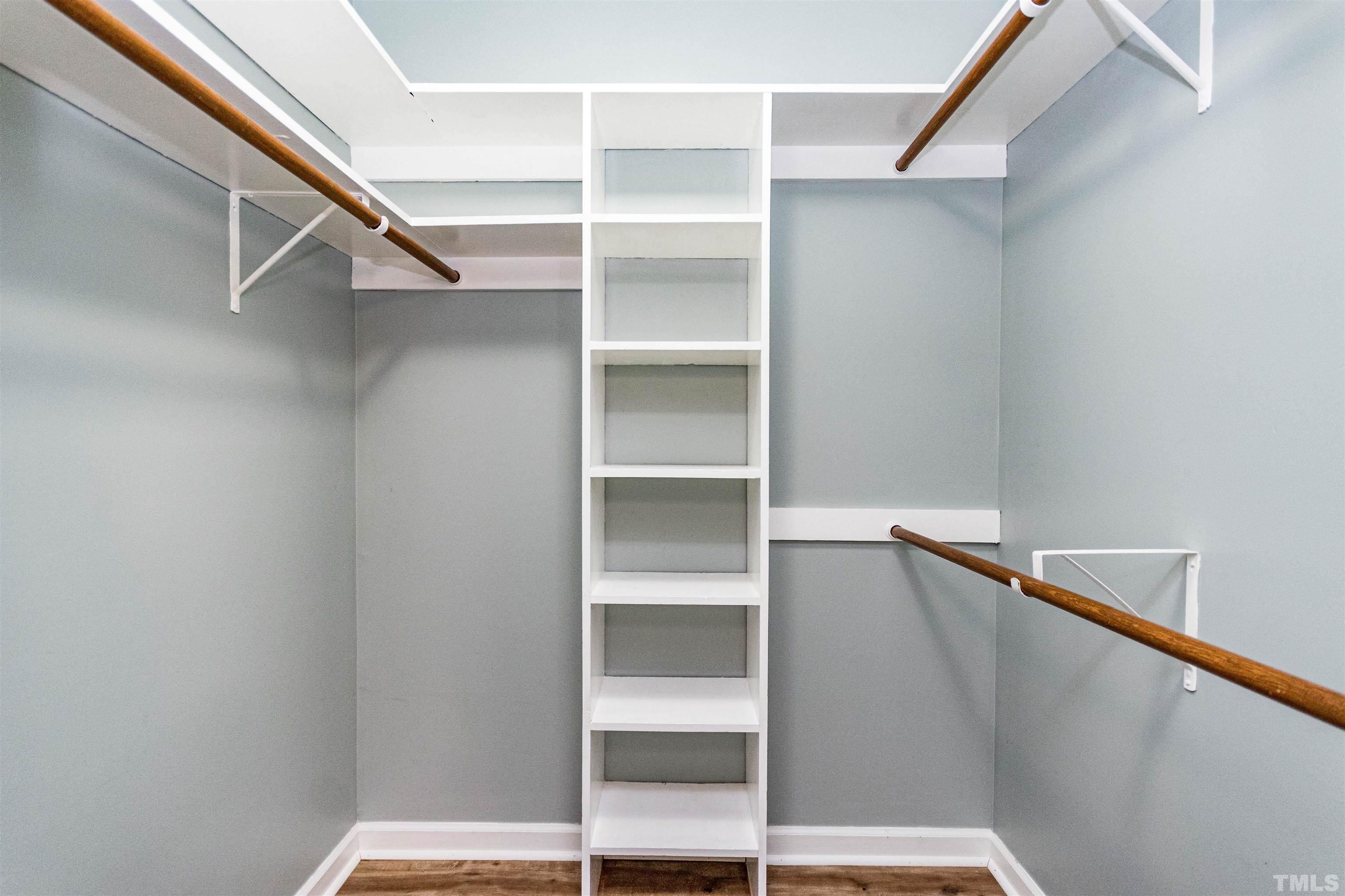 5218 Deer Haven Drive, Unit 5218 Raleigh, NC 27606 - Photo 16 of 27 a view of walk in closet with empty racks