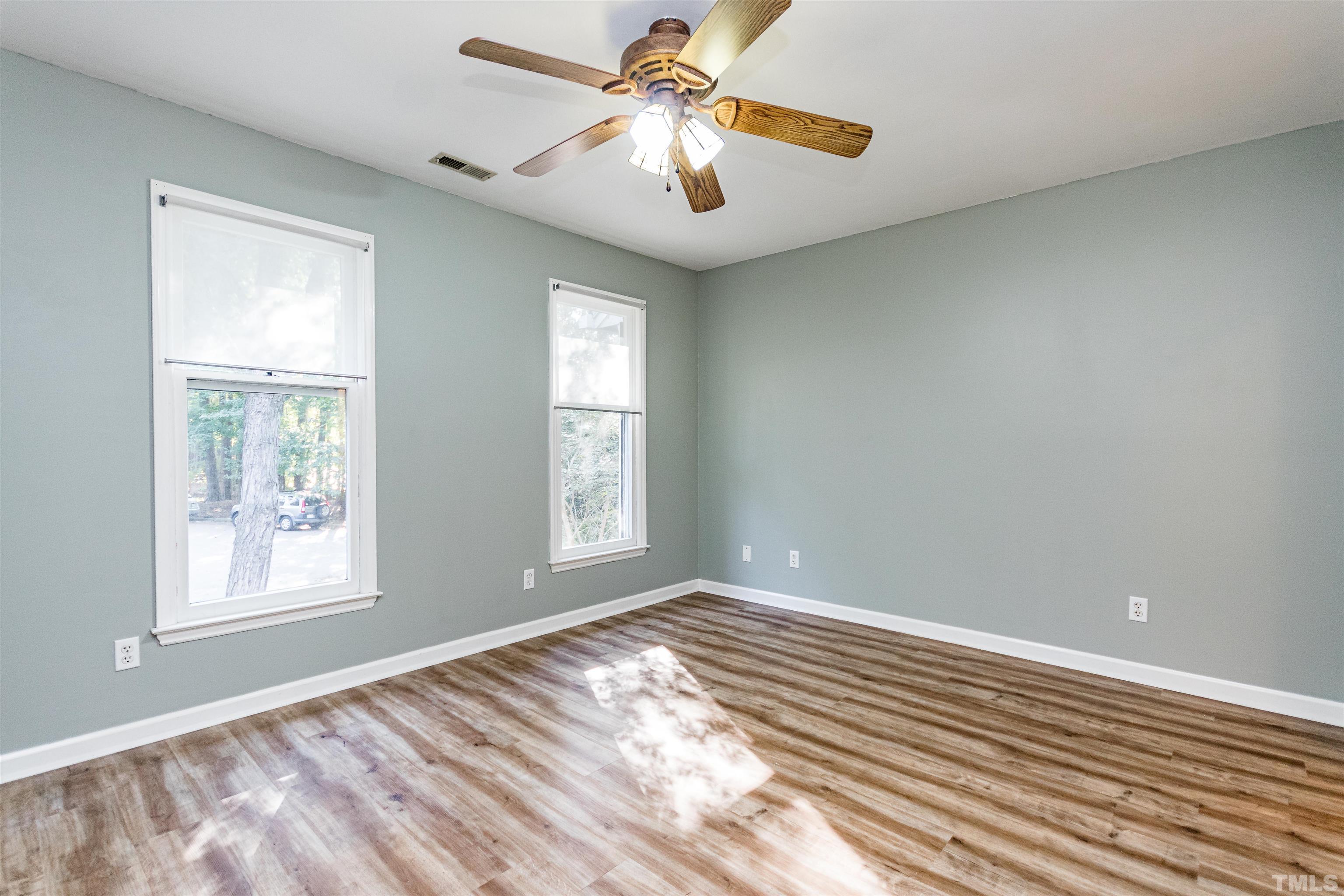 5218 Deer Haven Drive, Unit 5218 Raleigh, NC 27606 - Photo 17 of 27 a view of room with window and ceiling fan