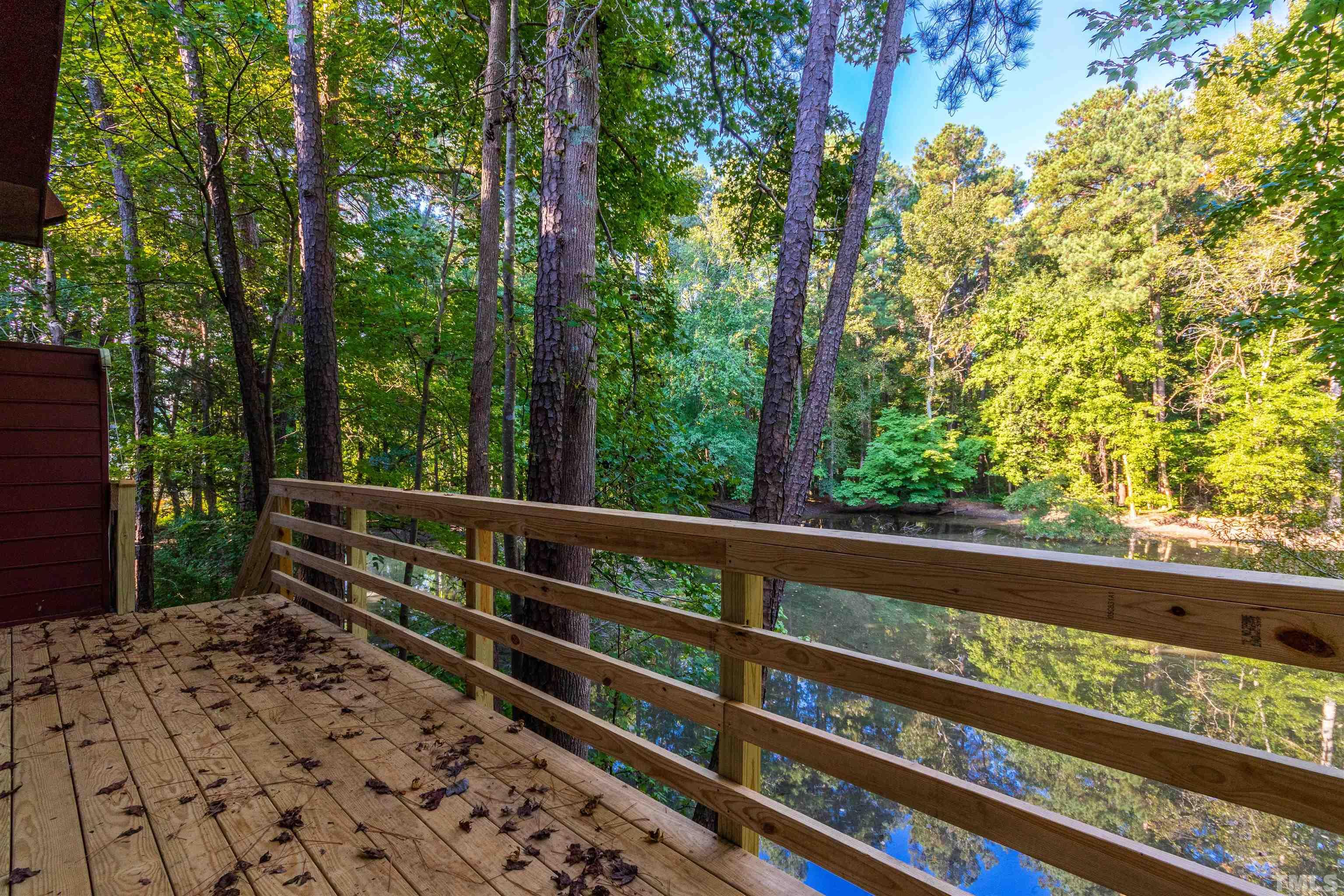 5218 Deer Haven Drive, Unit 5218 Raleigh, NC 27606 - Photo 2 of 27 a view of a two chair in the balcony