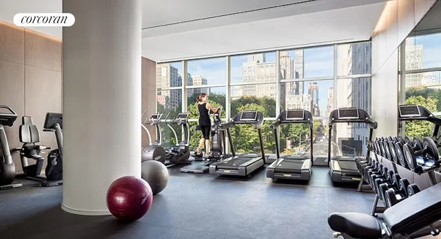 a living room with a couch and large window