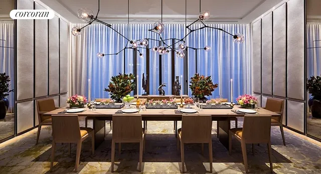 a view of a dining table and chairs