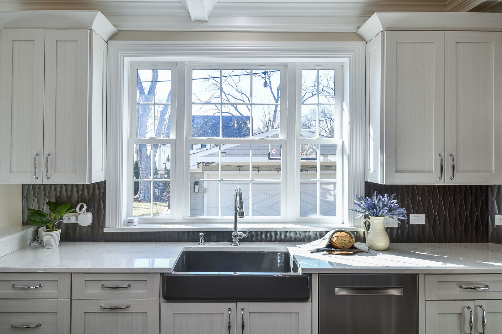 325 North Wright Street Naperville, IL 60540 - Photo 12 of 53 a kitchen with a sink a counter and cabinets